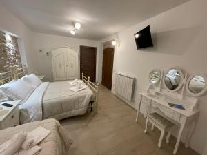 A bed or beds in a room at B&B I Giardini
