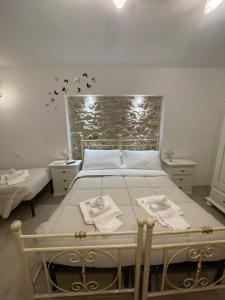 A bed or beds in a room at B&B I Giardini