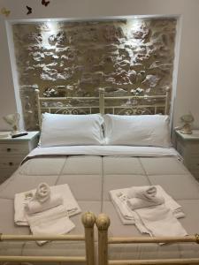A bed or beds in a room at B&B I Giardini