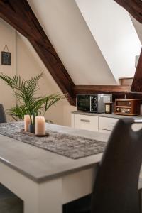 Kuchyň nebo kuchyňský kout v ubytování MOREHOME-Apartments Oldtown Flair