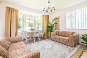 a living room with a couch and a table at Space House in Sheffield