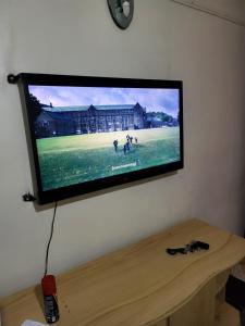 TV a/nebo společenská místnost v ubytování G&G Executive One Bedroom Ngala 2