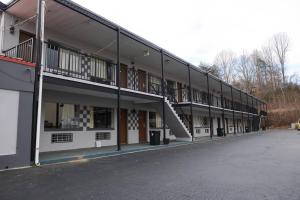 an empty building with a staircase on the side of it at Relax Inn in Collinsville