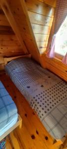 Postel nebo postele na pokoji v ubytování Seoski Turizam Feniks - apartman Ostrog