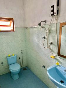 Koupelna v ubytování Jasmin Homestay Marakolliya