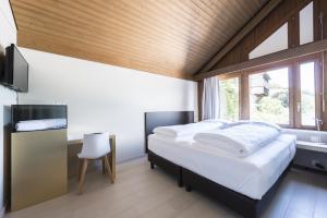 Postel nebo postele na pokoji v ubytování Boutique Hotel Riviera + 24 fotografií