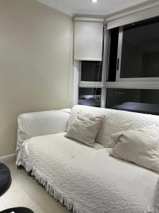 Parquemar R tesisinde bir odada yatak veya yataklar