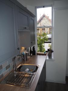 Kuchyň nebo kuchyňský kout v ubytování Uist Cottage