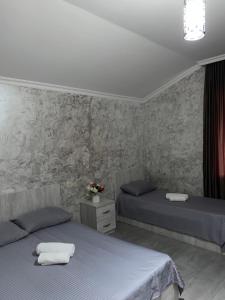 Postel nebo postele na pokoji v ubytování MaRI&GIO