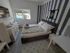 Uma cama ou camas num quarto em Villa Stefaner