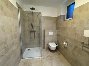 Koupelna v ubytování Apartmán U lesa