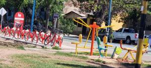 a bunch of bikes parked on a street at Departamento Mendoza in Mendoza