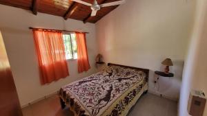 En eller flere senge i et værelse på Mi Recreo CABAÑAS + 18 billeder