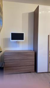 TV a/nebo společenská místnost v ubytování Trastevere B&D Rooms