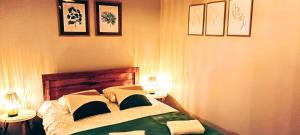 Ένα ή περισσότερα κρεβάτια σε δωμάτιο στο Drzewna Apartamenty - Kupiecka 39