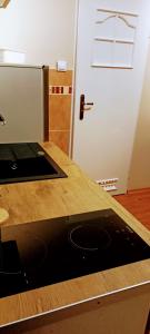 Η κουζίνα ή μικρή κουζίνα στο Drzewna Apartamenty - Kupiecka 39