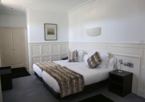 Postel nebo postele na pokoji v ubytování Hotel Olajauregi