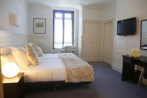 Postel nebo postele na pokoji v ubytování Hotel Olajauregi