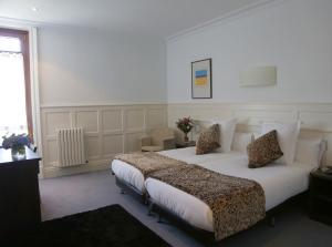 Postel nebo postele na pokoji v ubytování Hotel Olajauregi + 37 fotografií