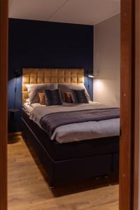 Säng eller sängar i ett rum på Chalet Auroras - Top quality 2 bdr chalet in prime location of Levi