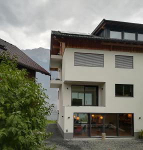 a house with a view of the mountains at Frühstückspension Zimmermann in Passriach