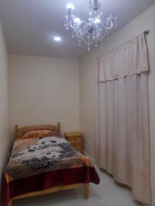 Voodi või voodid majutusasutuse Hostal Atlantis toas