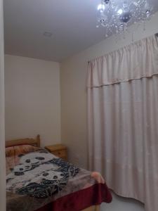 Voodi või voodid majutusasutuse Hostal Atlantis toas