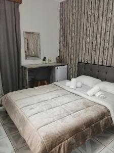 Postel nebo postele na pokoji v ubytování Hotel Efyra