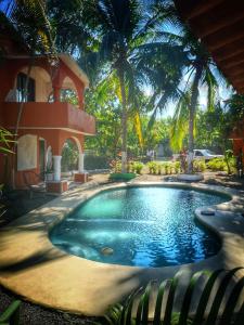 Der Swimmingpool an oder in der Nähe von Casa Iguana
