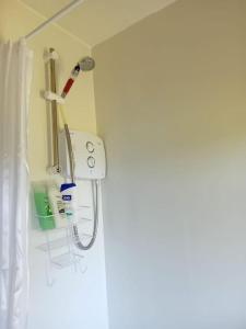 a hospital room with a hook up to a wall at Millbrook House in Oldcastle