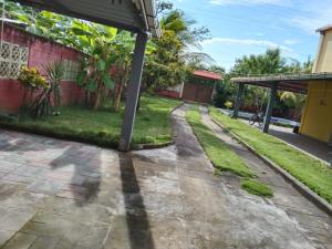 a walkway in front of a house at Casa para descanso familiar in San Pedro Masahuat