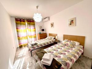 Ένα ή περισσότερα κρεβάτια σε δωμάτιο στο Las Pirañas 2