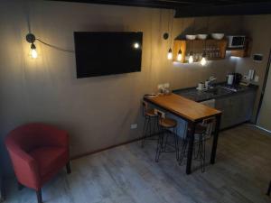 TV a/nebo společenská místnost v ubytování Los Maquis e Inacayal