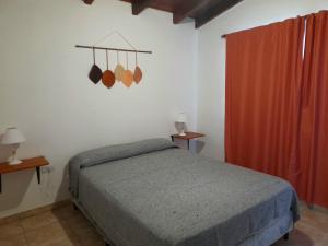 Ліжко або ліжка в номері Cabañas Santa Isabel