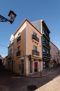 a building on the side of a street at NewStar Duplex in Setúbal