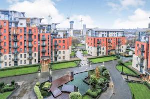 an aerial view of a city with buildings at Spacious 4 Beds Apt - Perfect for Families, Contractors & FREE Parking in Leeds