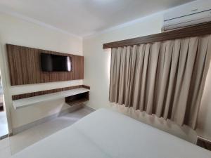 Lacqua diRoma RM Hospedagem客房内的一张或多张床位