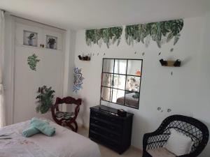 Posteľ alebo postele v izbe v ubytovaní Apartamento en Playa Semi-Privada