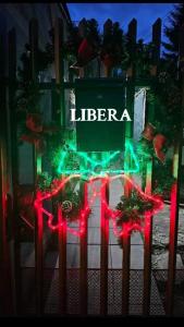 a table with red lights and a sign that says liberia at Libera in Sofia