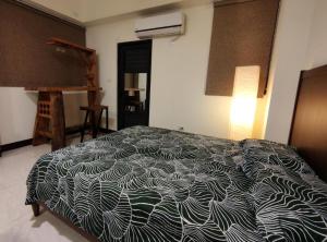Postel nebo postele na pokoji v ubytování Lin's B&B