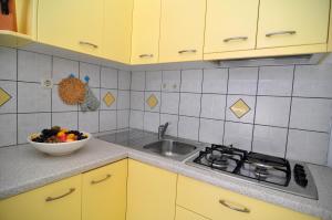 Kuchnia lub aneks kuchenny w obiekcie Apartments Livia