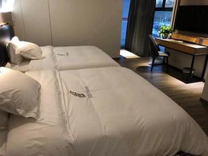 Φωτογραφία από το άλμπουμ του JUNYI Hotel Nanjing Olympic Sports Center σε Ναντζίνγκ +29 φωτογραφίες