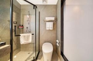 Ванна кімната в Thank Inn Chain Hotel Jiangsu Changshu Meili Town Meili