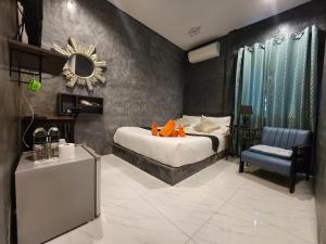 Ένα ή περισσότερα κρεβάτια σε δωμάτιο στο La Chambre Boutique @ Ko Lanta