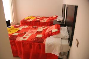 Ένα ή περισσότερα κρεβάτια σε δωμάτιο στο Rolovi Hotel Xalapa Centro