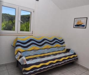 Łóżko lub łóżka w pokoju w obiekcie Apartments Livia