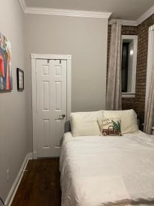 A bed or beds in a room at Private one bedroom one bathroom