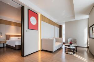Letto o letti in una camera di Echeng Hotel - Huawei Base Store in Shenzhen