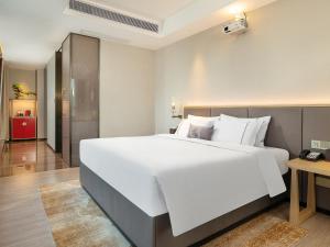 Letto o letti in una camera di Echeng Hotel - Huawei Base Store in Shenzhen