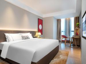 Letto o letti in una camera di Echeng Hotel - Huawei Base Store in Shenzhen